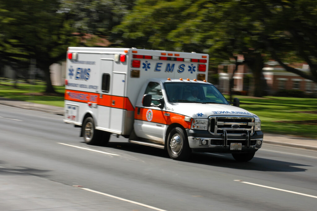 Ambulance speeding to car crash